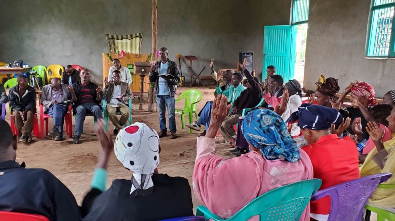 A group of people worshipping together in a church in Ethiopia