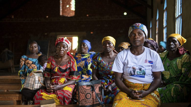 Women sit in a church service held in the parish of Kiwata village, Butembo, Democratic Republic of Congo, on 12 December 2021. Tearfund Canada continues to support several training and outreach programmes, with the help of CBCA, in the Democratic Republic of Congo in order to assist vulnerable communities out of poverty.