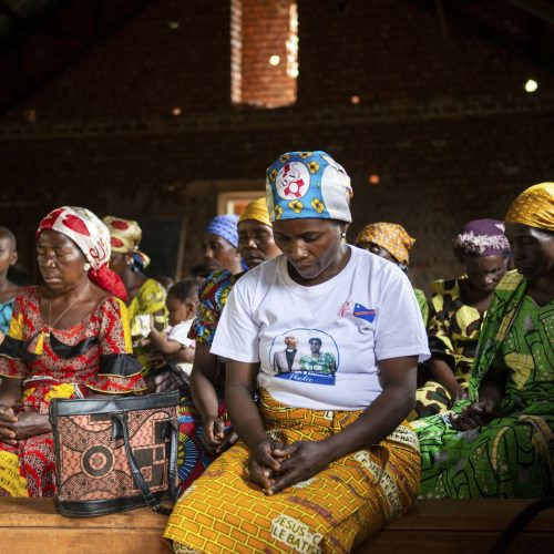 Women pray during a church service held in the parish of Kiwata village, Butembo, Democratic Republic of Congo, on 12 December 2021. Tearfund Canada continues to support several training and outreach programmes, with the help of CBCA, in the Democratic Republic of Congo in order to assist vulnerable communities out of poverty.